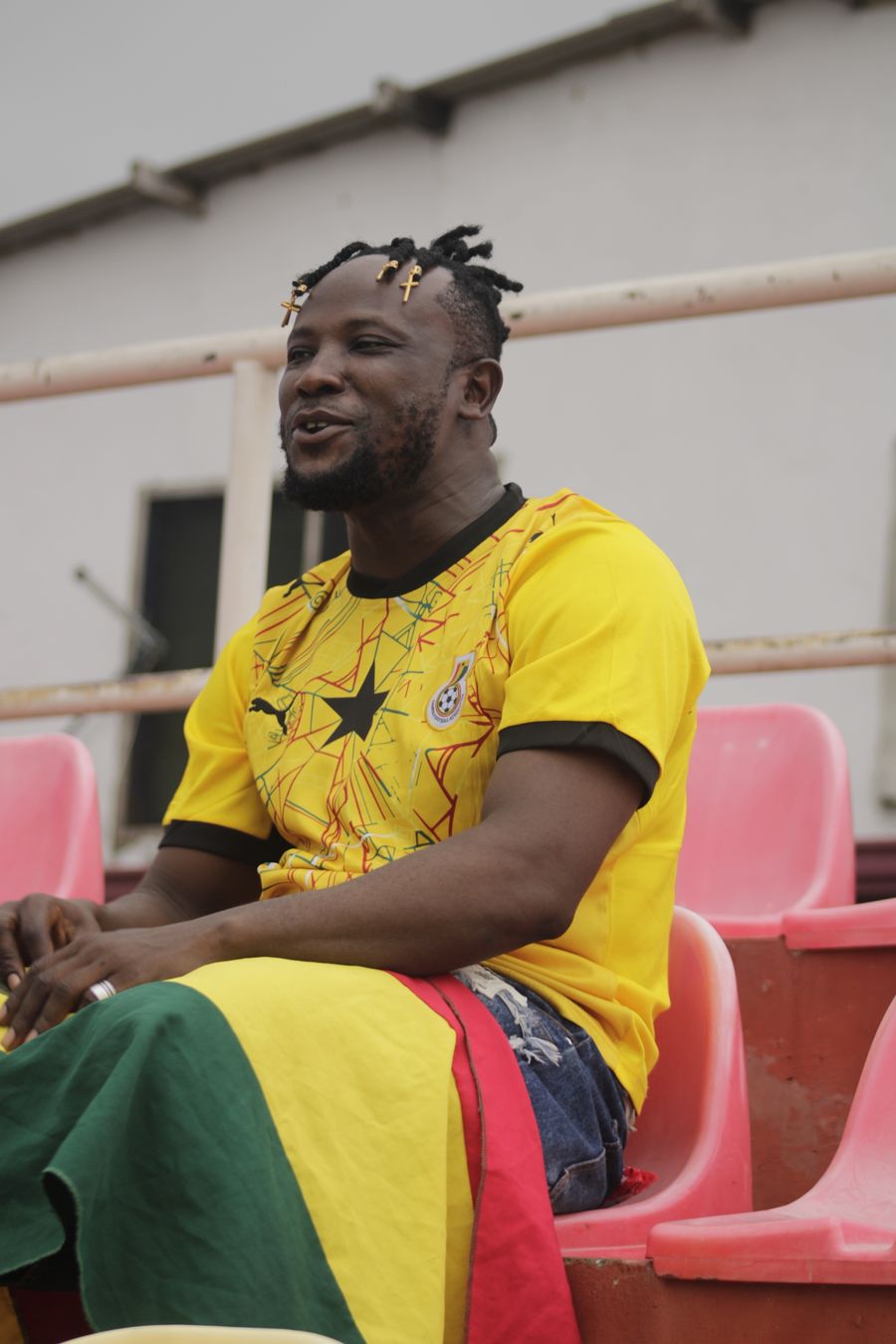 Fan wearing the Ghana · Men's kit
